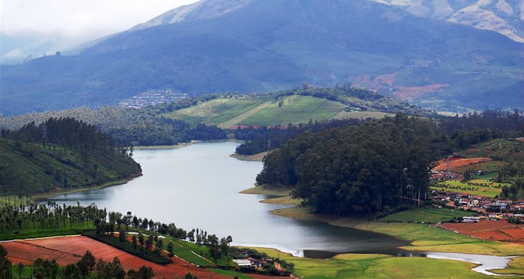 Ooty Lake surrounded by forested Nilgiri hills